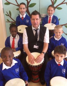 Phil Needham with year 3 African drummers